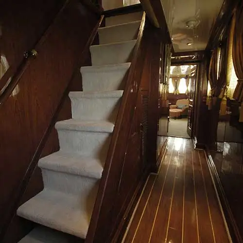 Interior staircase inside MY Kalizma luxury yacht designed by Jimmy Mistry