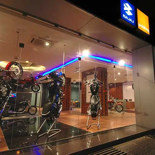 Motorcycle display wall inside Probiking showroom designed by Jimmy Mistry