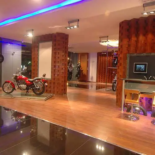 Retail lounge seating area inside Probiking showroom designed by Jimmy Mistry