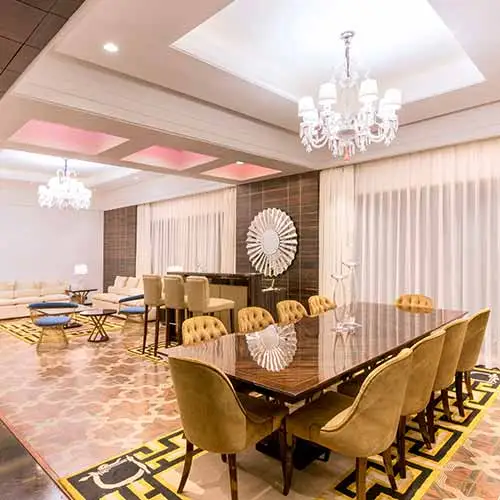 Elegant dining area inside Della Resorts luxury villa