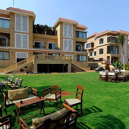 Garden outdoor seating area at Della Resorts Villas