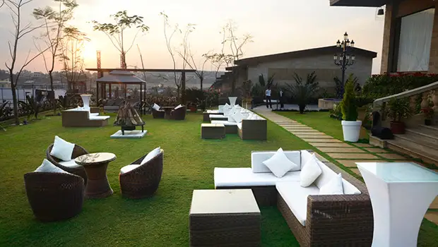 Green lawn event space at Della Resorts Lonavala