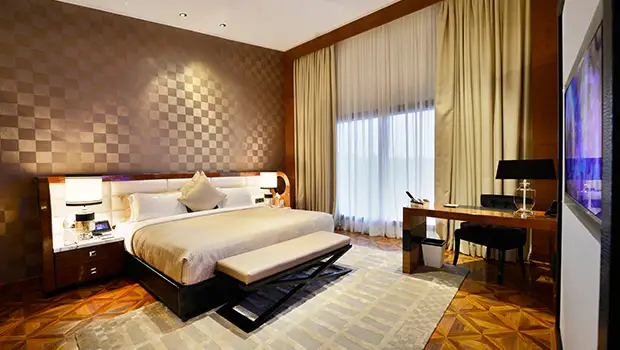 Luxury bedroom interior in villa at Della Resorts Lonavala
