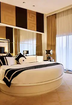 Luxury villa bedroom interior at Della Resorts in Lonavala